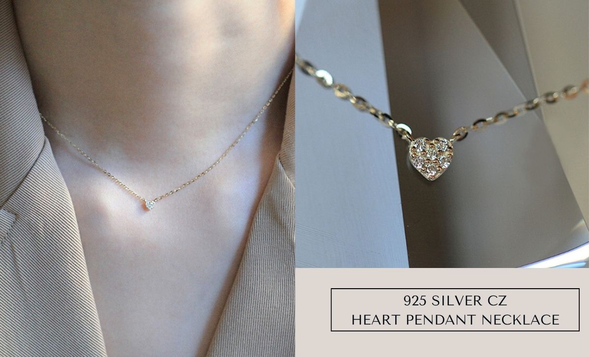 A model wearing the 925 silver CZ heart pendant necklace, showcasing its delicate and romantic style.