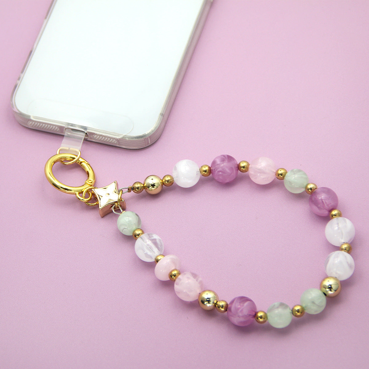 Beaded phone strap attached to a smartphone case