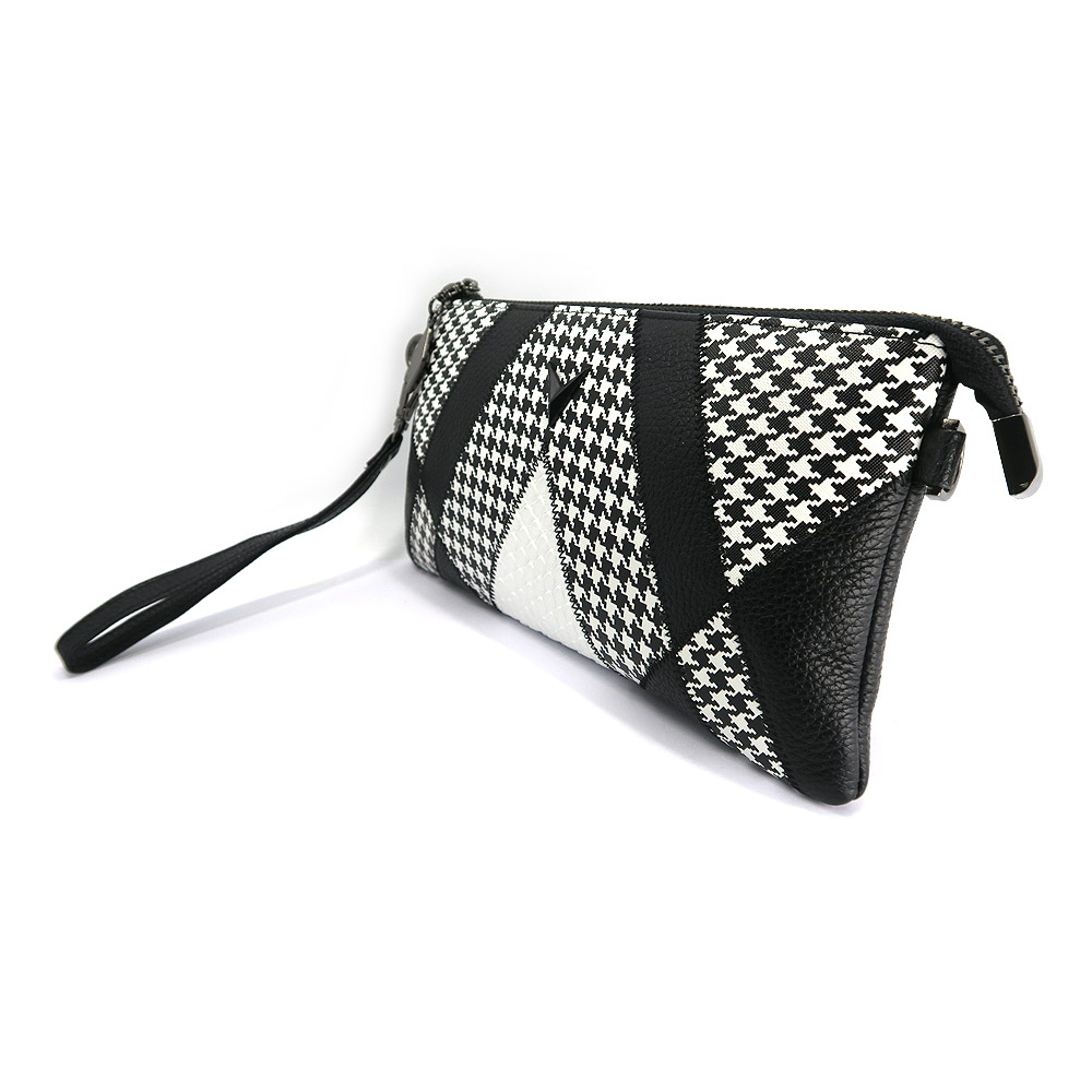 Detailed view of the Patchwork PU Leather Clutch Bag texture