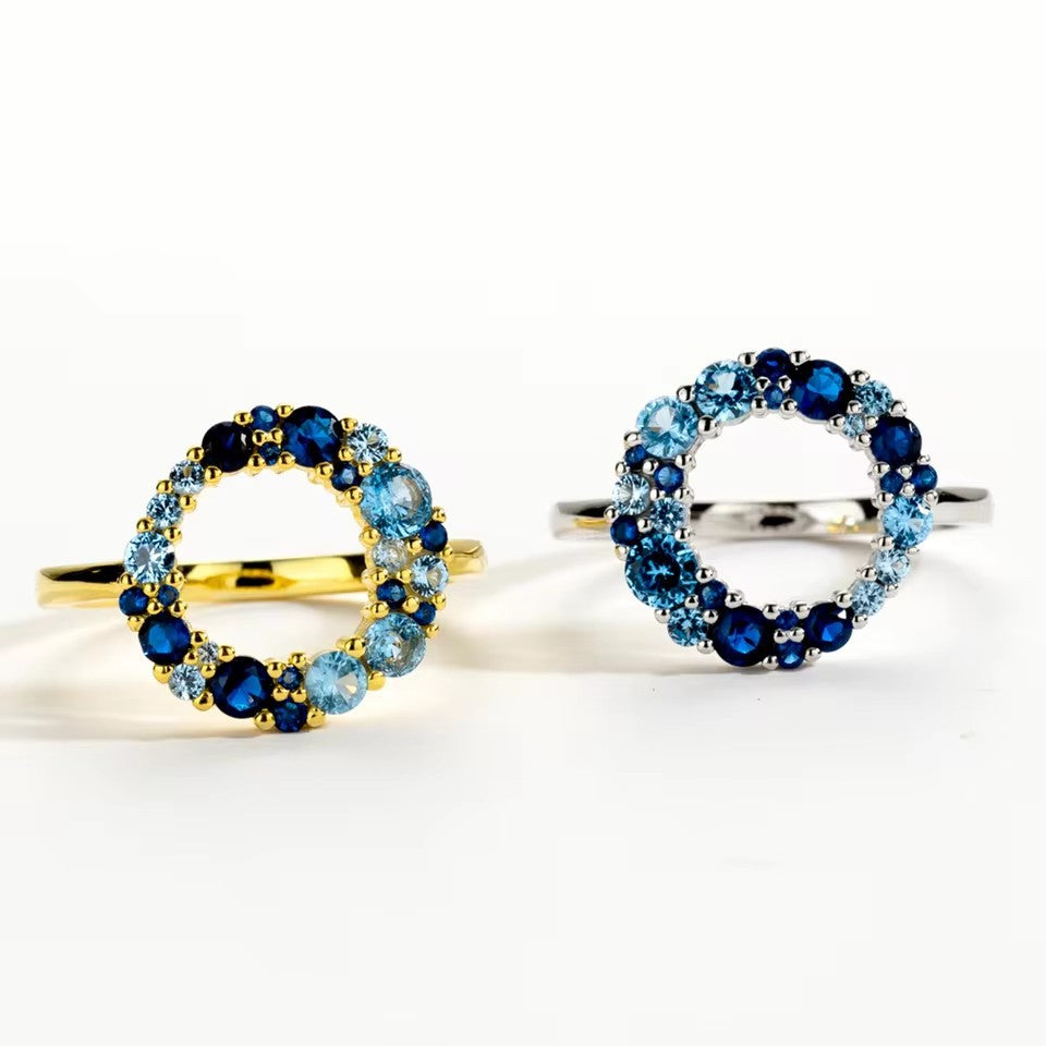 A pair of modern minimalist rings in both silver and gold finishes