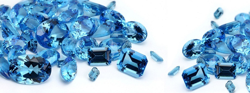 A collection of serene blue aquamarine gemstones, the birthstone for March.