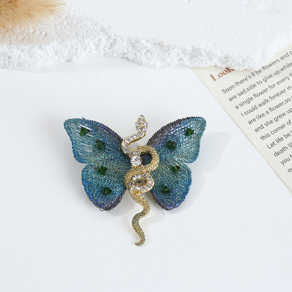 The butterfly brooch shown in the elegant blue color variant