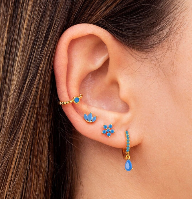 Model wearing the Turquoise Hoop Earrings Set to showcase its elegant style