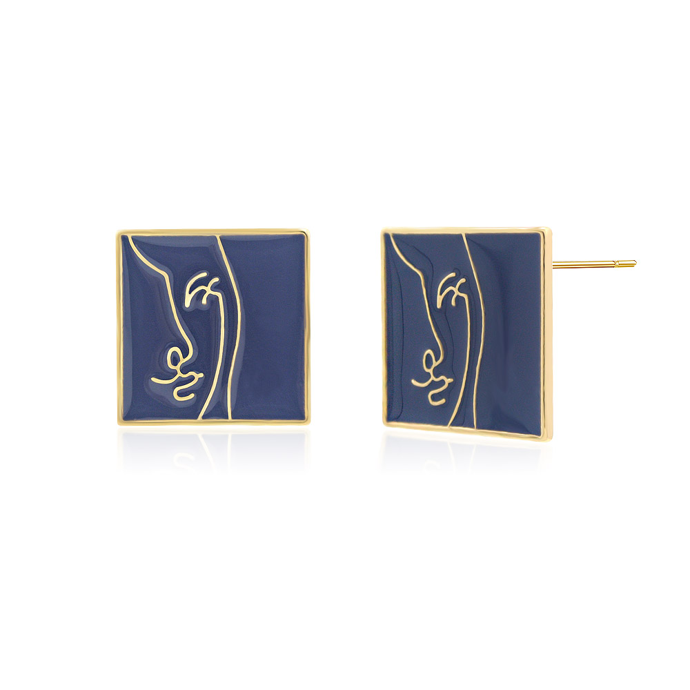 Close-up of the purple enamel face design on the square earring