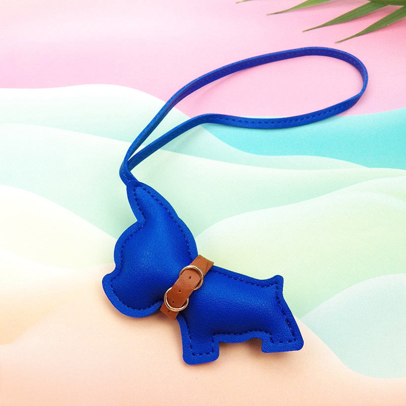 Detailed view of the blue PU leather French Bulldog keychain