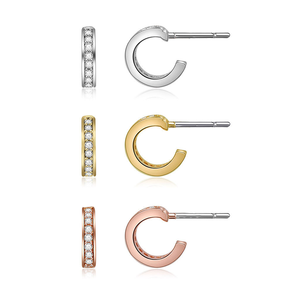 Detailed side view of the three-tone open hoop pave post earrings