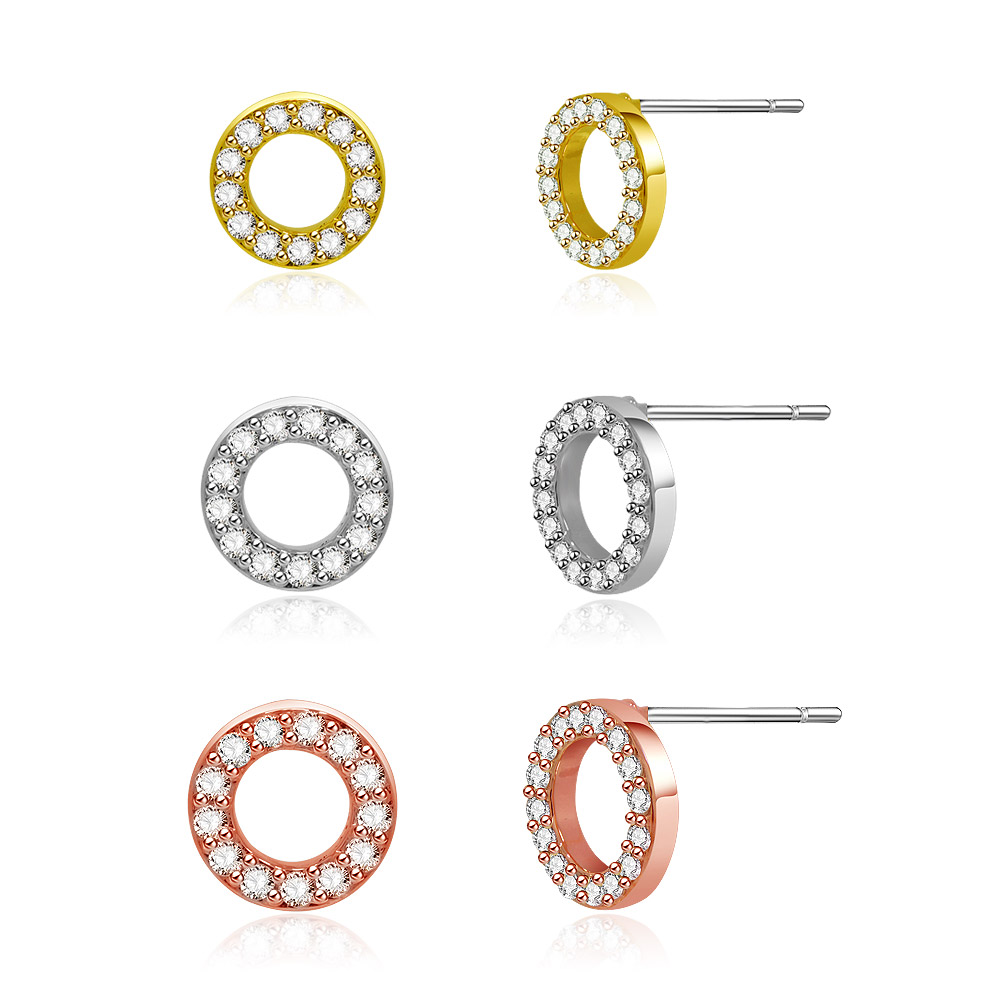 Close-up of the three-tone circle stud earrings highlighting the sparkling stones