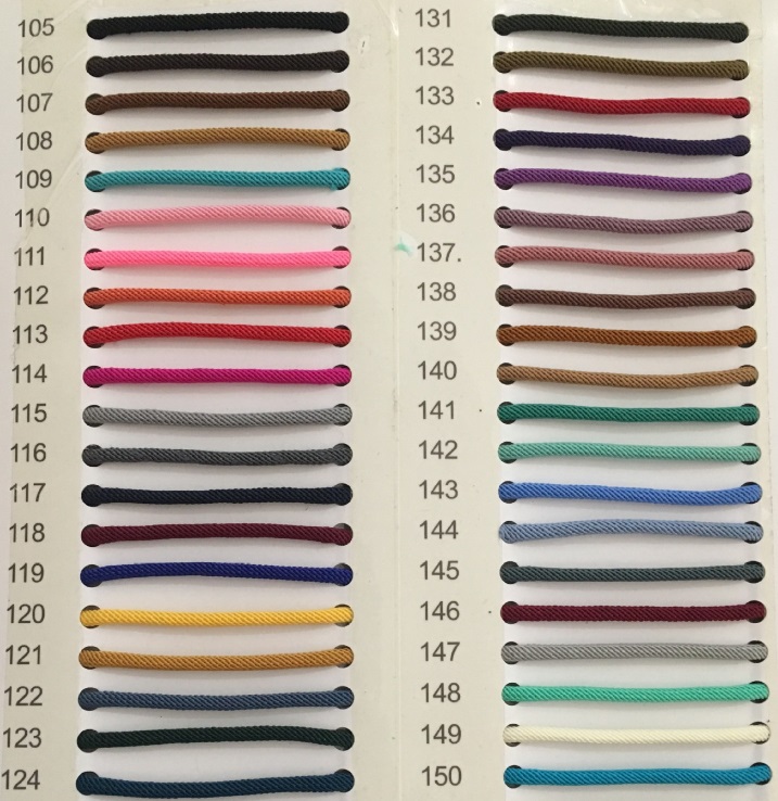 A swatch card showing a wide variety of colored cords available for custom bracelets.