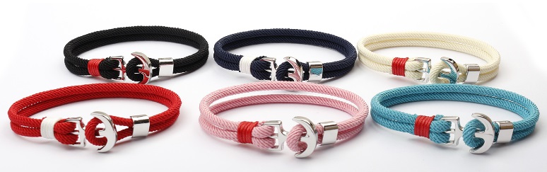 A variety of colorful rope bracelets with silver anchor clasps