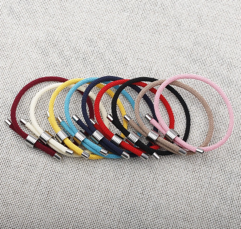 A variety of colorful rope bracelets with stainless steel clasps