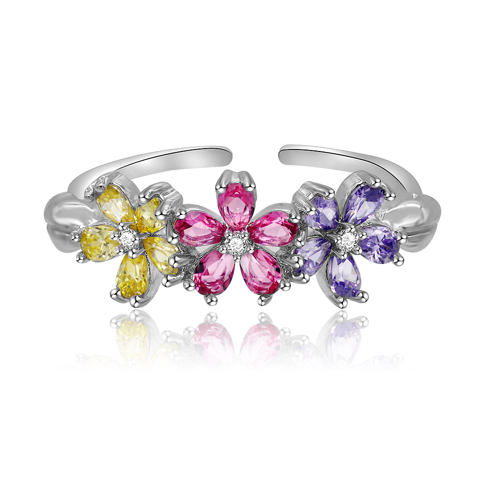 Detailed view of the Triple Color Floral Ring's gemstone arrangement