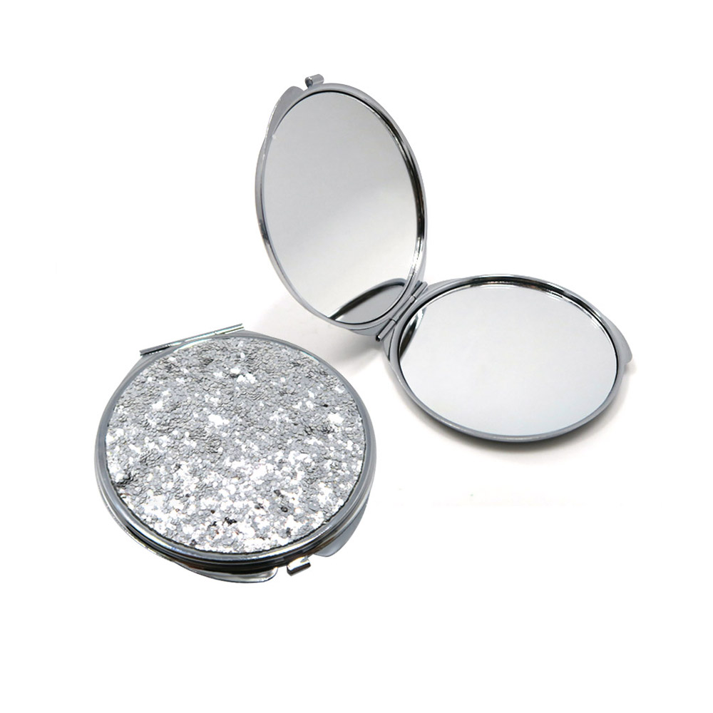Close-up of the sequin flat cosmetic compact mirror with a glittery finish