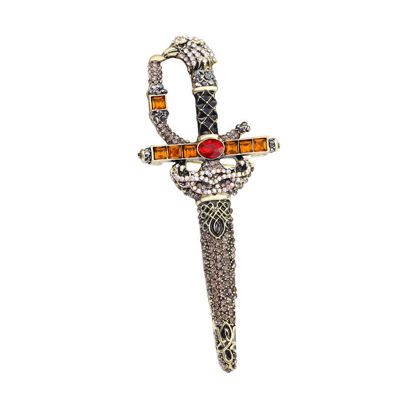 Detailed view of the rhinestone retro sword brooch with a snake hilt and colorful gemstones
