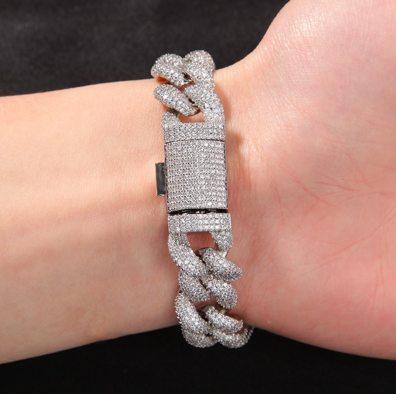 Close-up of the iced out bracelet's interlocking links and secure clasp