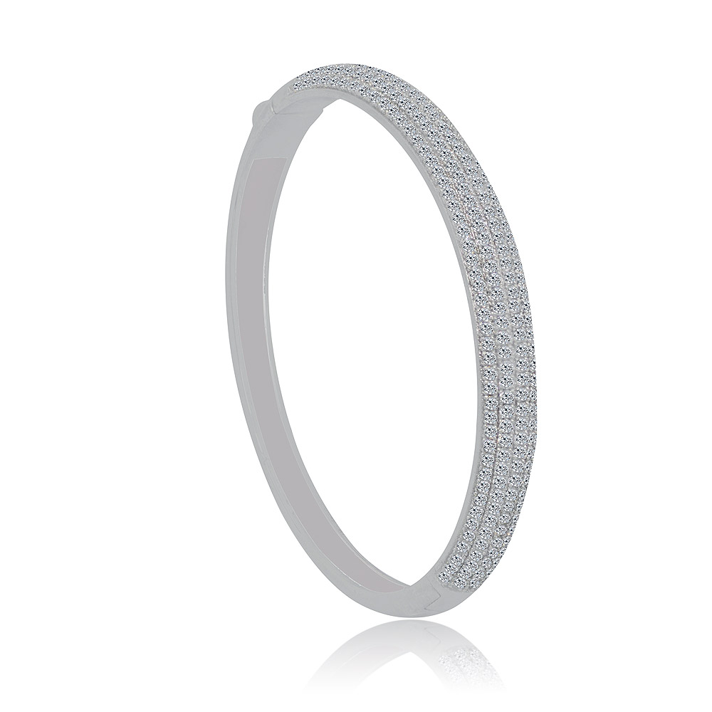 A stunning rhodium-plated oval pave bangle adorned with rows of clear cubic zirconia.