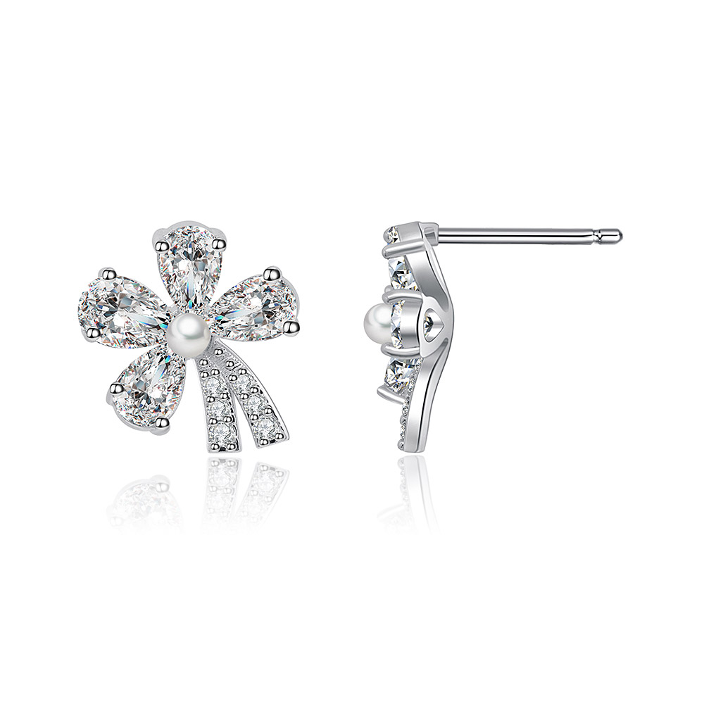 Close-up of CZ Flower Studs showing the intricate details of the cubic zirconia petals and central pearl.