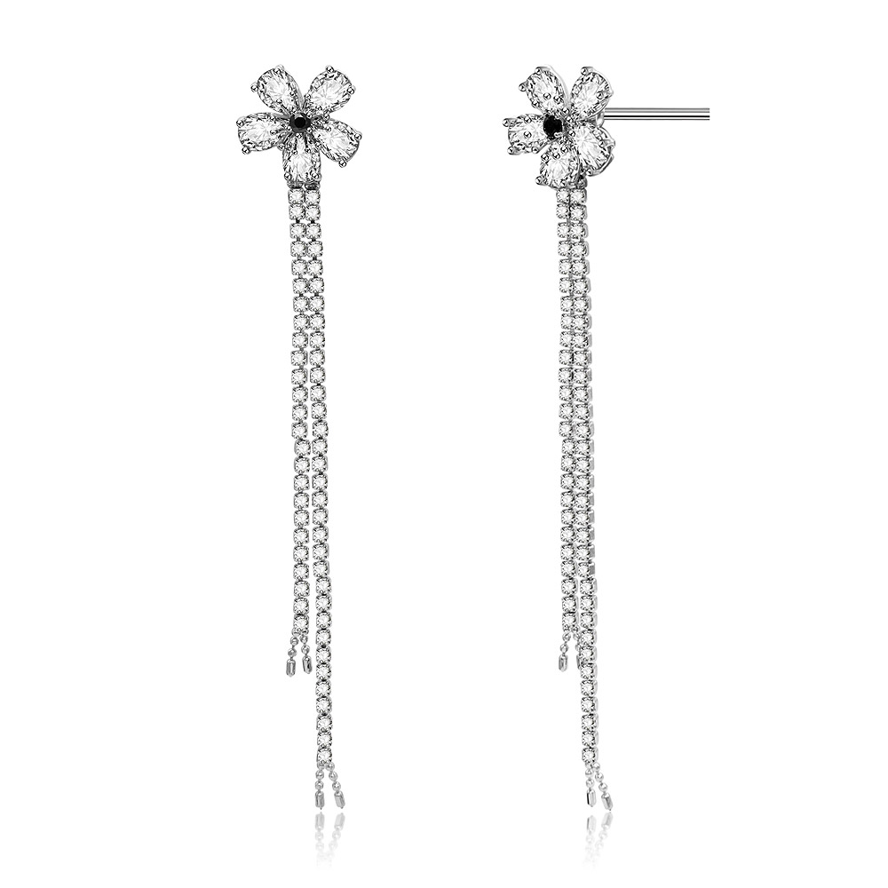 A detailed view of the floral chandelier earrings' cubic zirconia stones