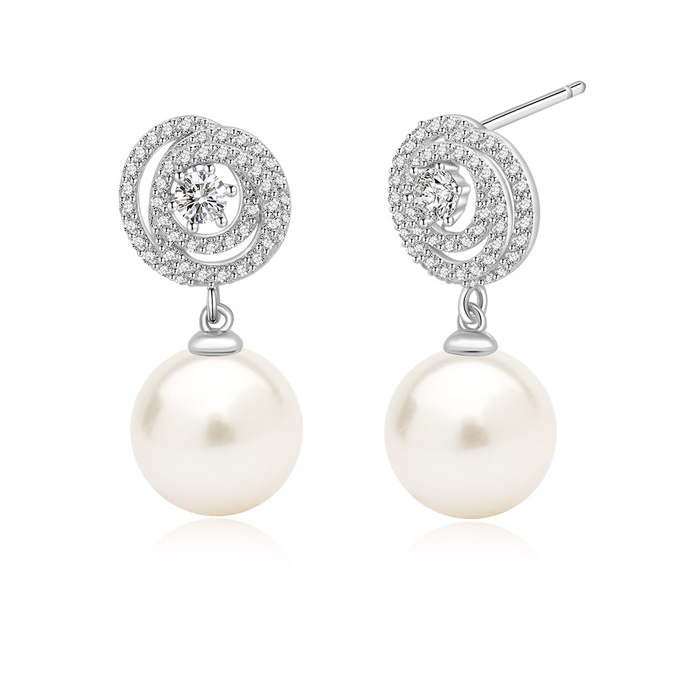 Close-up of the diamond and pearl earrings showing the post closure