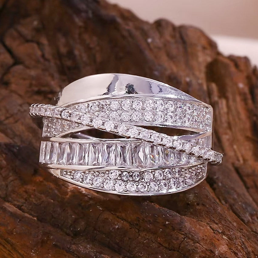 A detailed close-up of the multi-layered bands of the cubic zirconia ring.