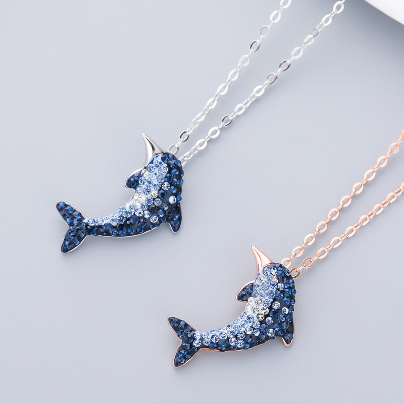 Silver and rose gold dolphin necklaces