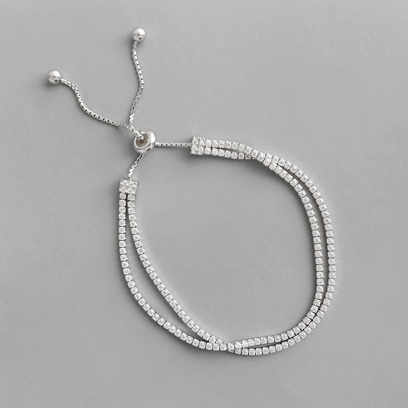 Close-up of the double-strand silver tennis bracelet with CZ stones