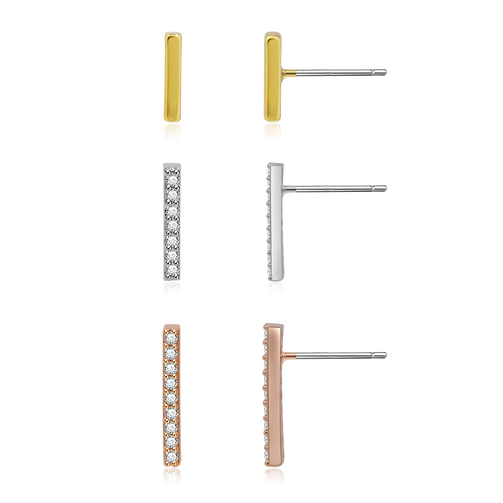 Close-up of the three-tone bar stud earrings