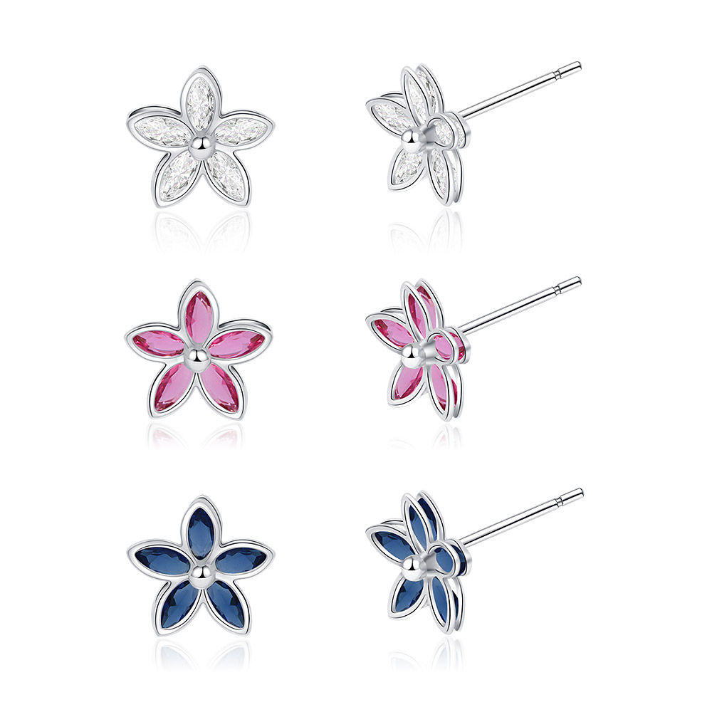 A detailed close-up of the flower stud earrings in three different colors.