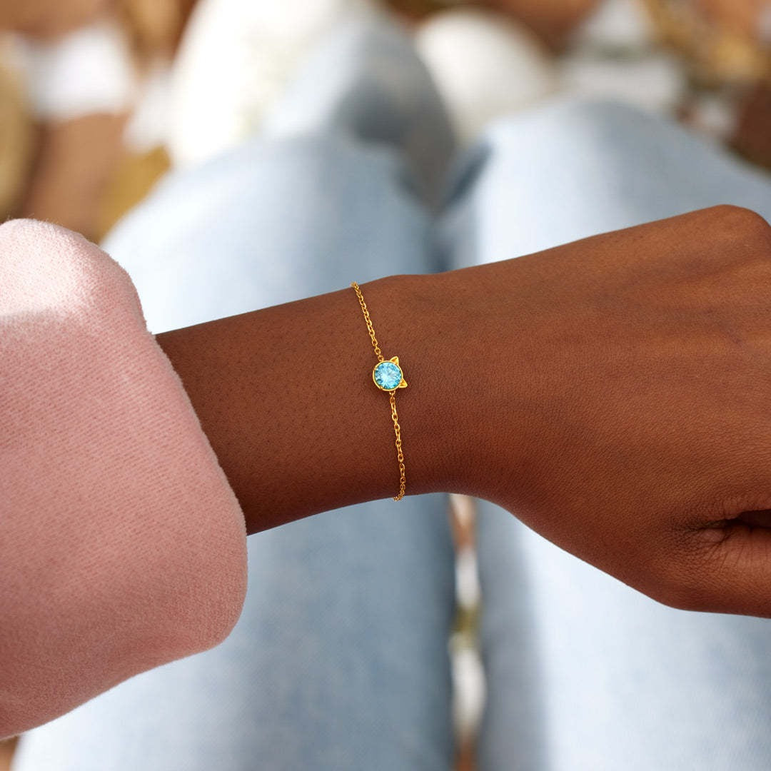 A model wearing the 925 sterling silver cat bracelet, highlighting its elegant design on the wrist.