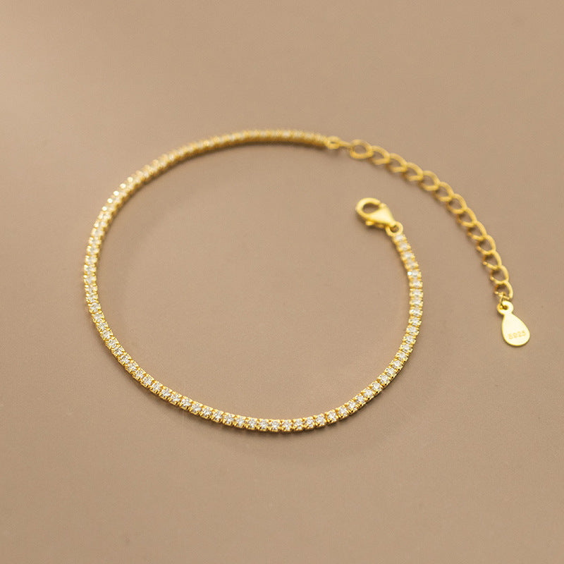 Gold finish 925 sterling silver tennis bracelet with cubic zirconia