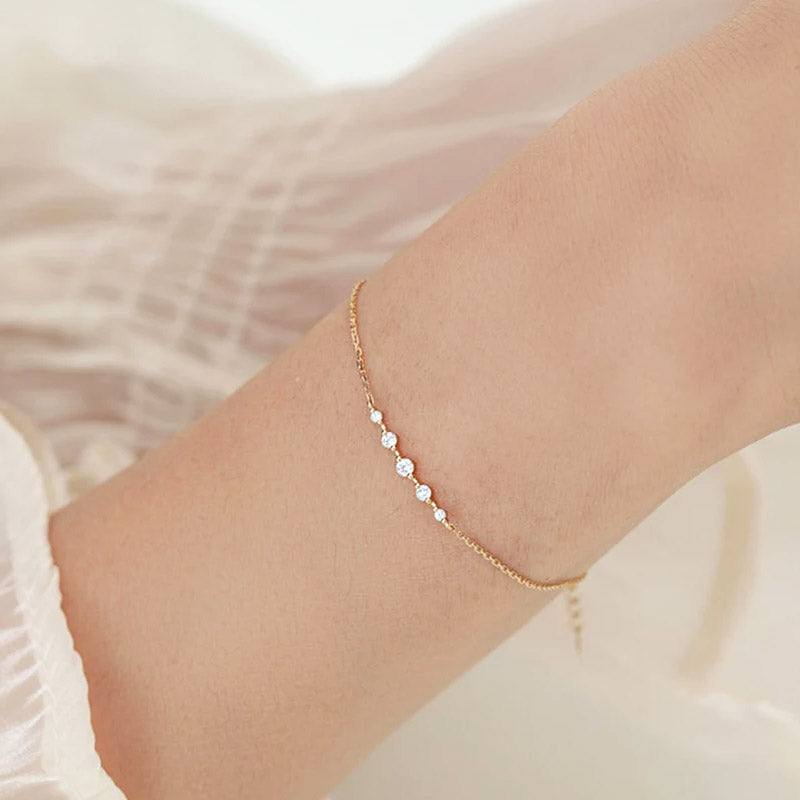 A model wearing the gold-plated zircon bracelet to showcase its style.