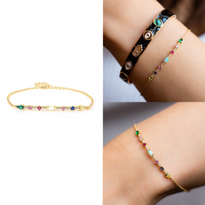 The multi-color CZ bracelet worn on a wrist, highlighting its sparkle.