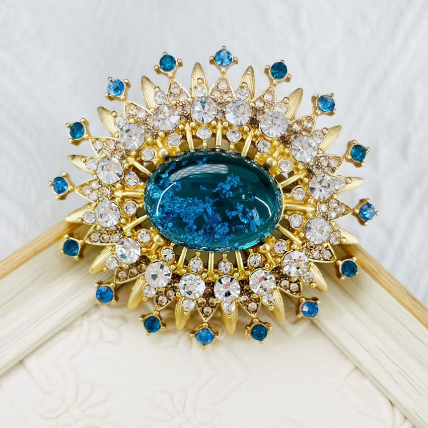 Detailed view of the Crystal Sun Vintage Brooch Pin
