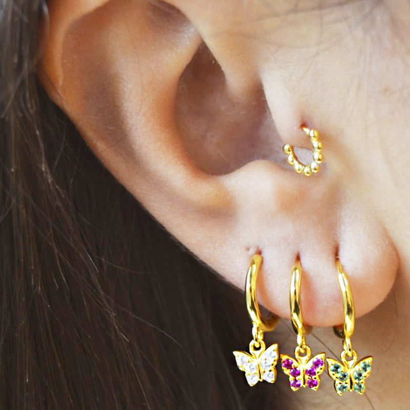 Model wearing the 925 Sterling Silver Butterfly Zircon Drop Earrings