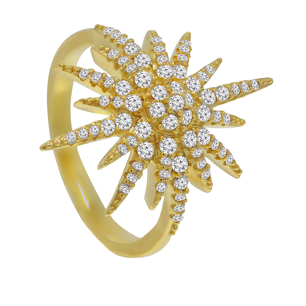 Detailed view of the Starburst Gold Ring on a reflective surface