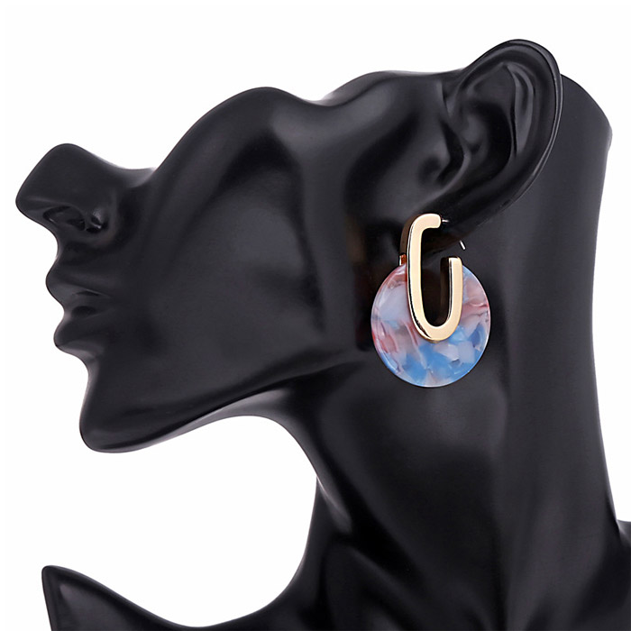 Sky Blue and Clouds hoop earring on a mannequin