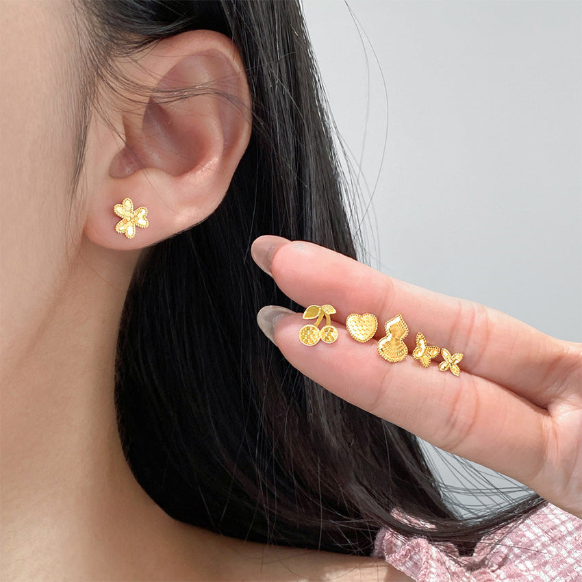 Model showcasing the versatile wearability of the laser-cut sterling silver stud earrings set.