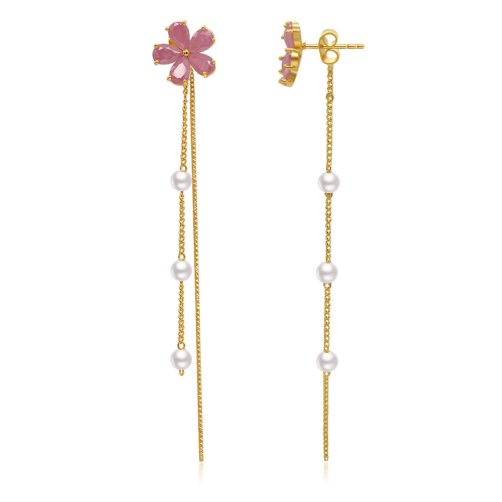 A pair of Pearl Blossomed Dangle Earrings displayed elegantly.