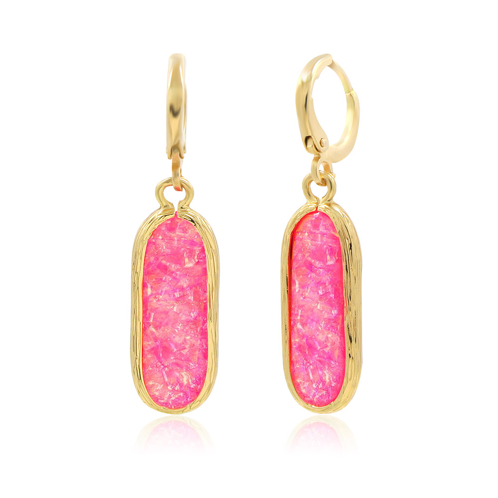 A detailed view of the marbled pink resin and textured gold-plated setting of the earrings.