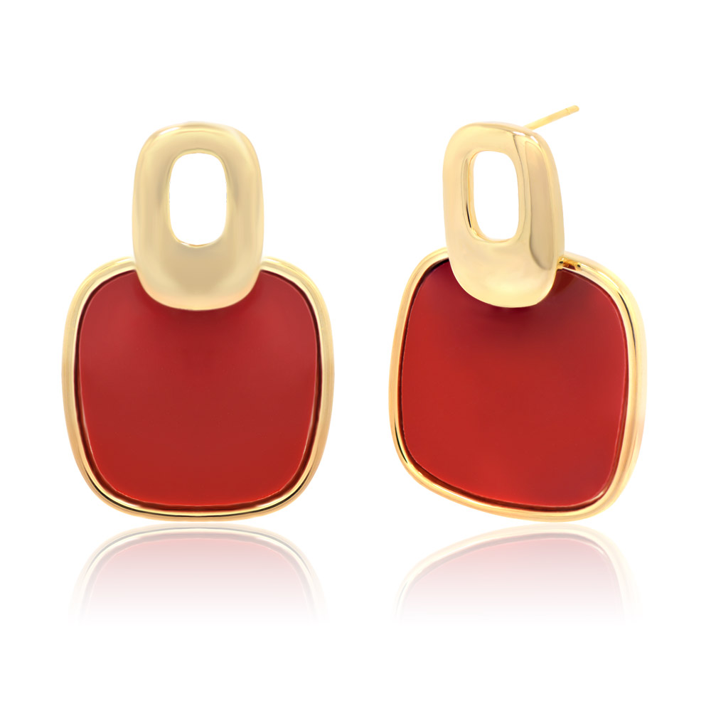 A close-up view of the Cubic Square Red Enamel Studs showcasing the glossy red epoxy and gold plating.
