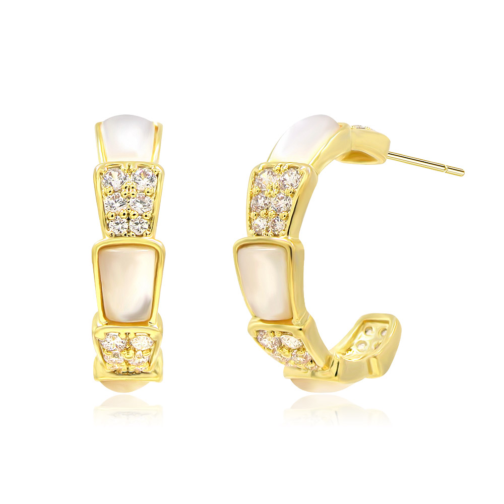 Detailed view of the Natural White Shell Snake Earrings showcasing the white inlays and clear stones