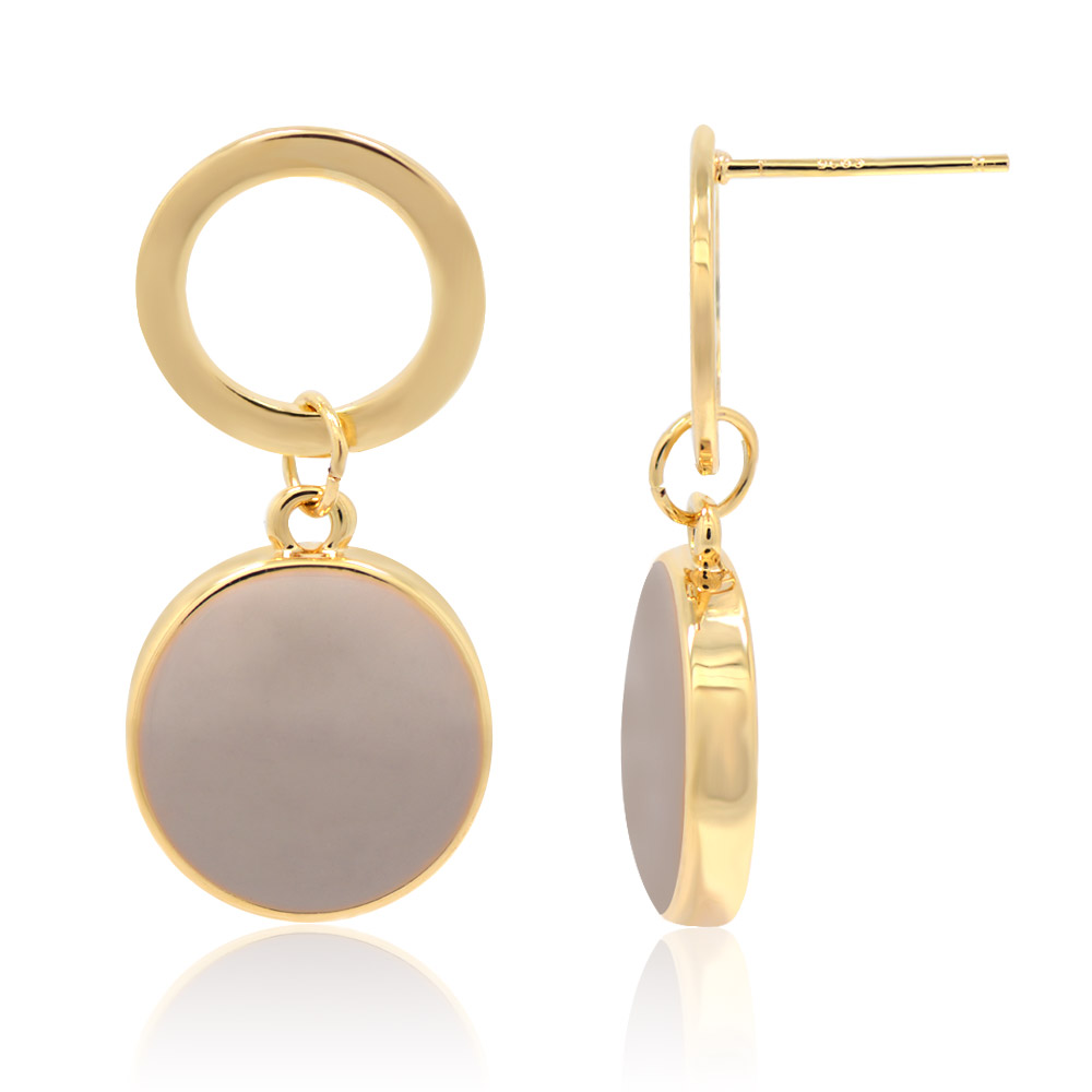 Close-up of the purple enamel finish on the round disc earrings