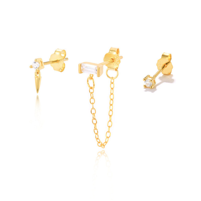 A display of three different tiny 925 sterling silver ear stud designs against a white background.