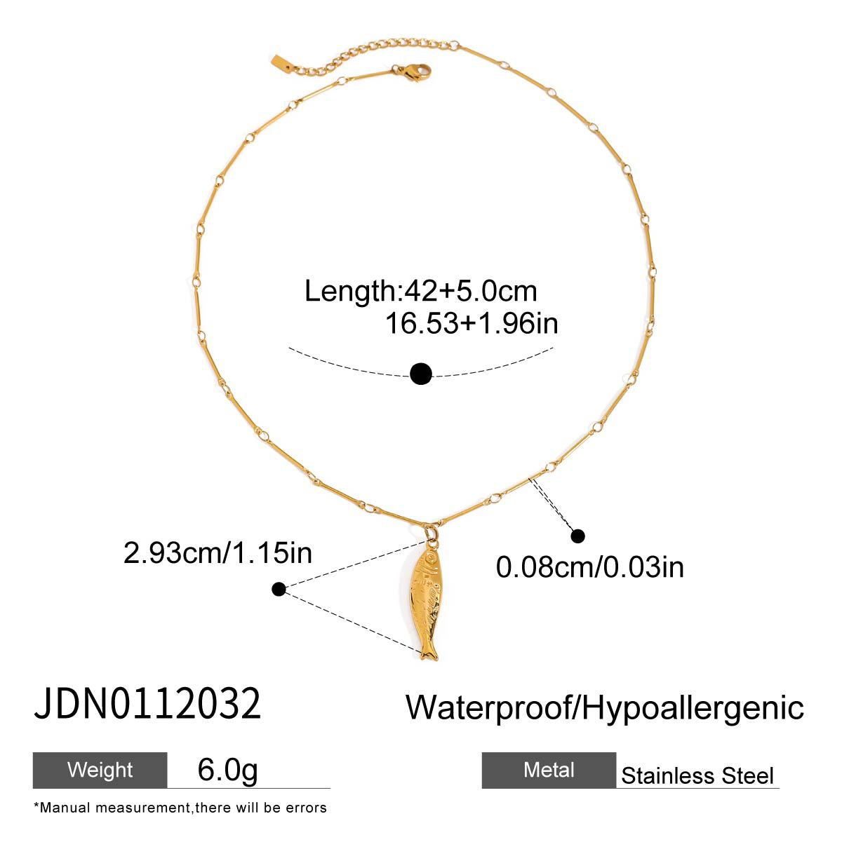 Model showcasing the gold fish necklace and earrings set for a summer look.