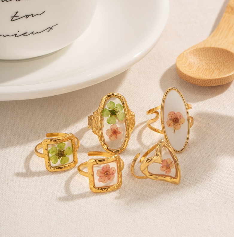 A collection of gold floral rings from JR Fashion Accessories