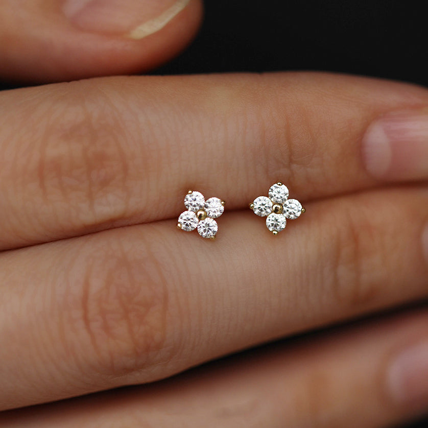 A pair of 925 silver four-leaf clover stud earrings with clear zircon gemstones