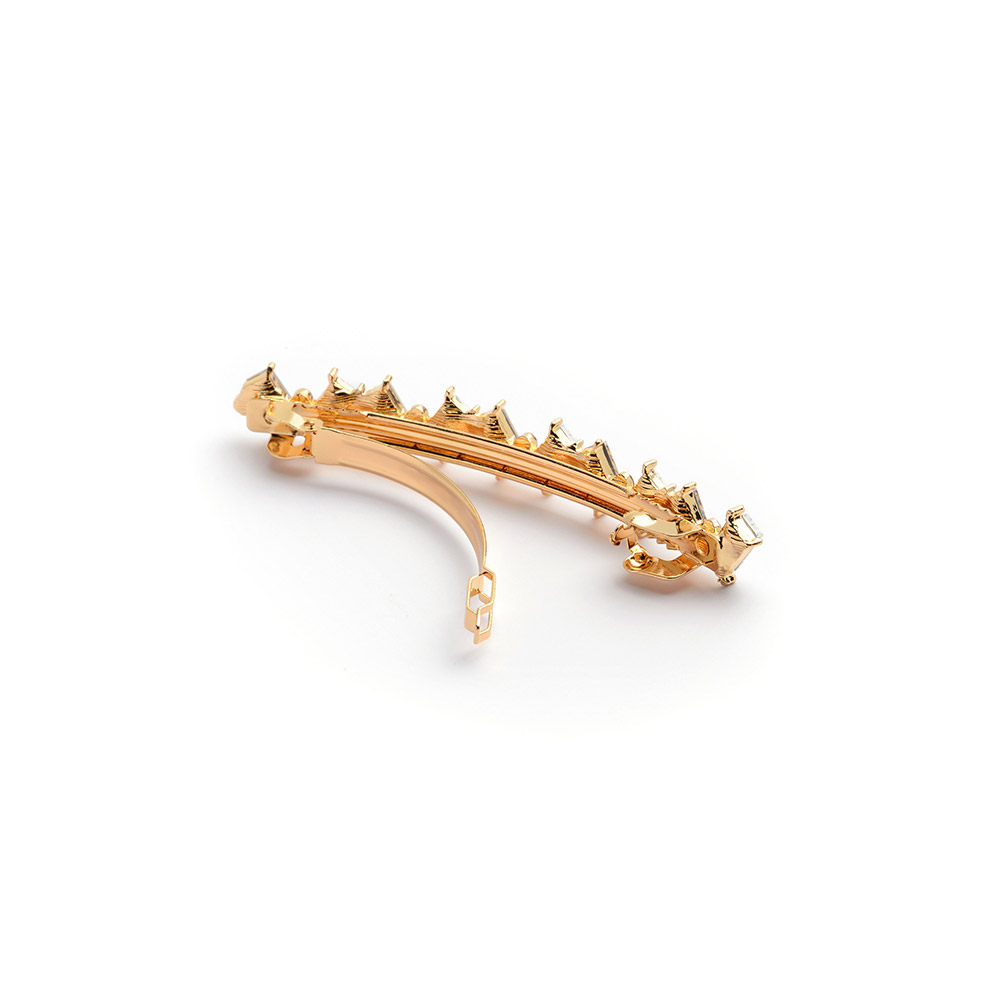 Side view of the gold rhinestone hair clip showing the secure barrette clasp