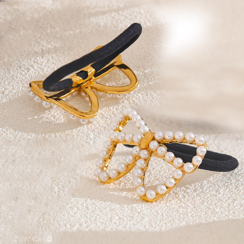 Gold and silver butterfly hair ties with pearl details
