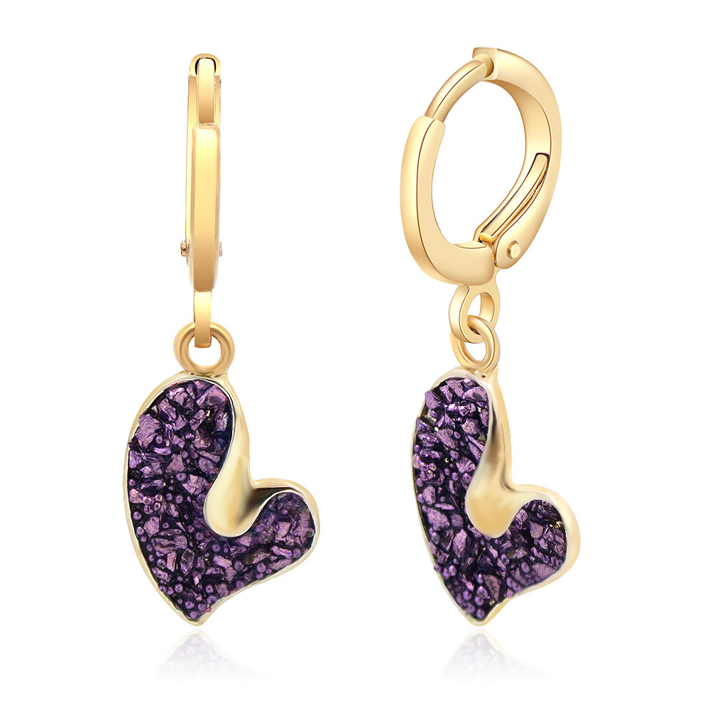 A detailed shot of the Sparkly Purple Glitter Love Heart Drop Earrings showcasing the texture and shine.