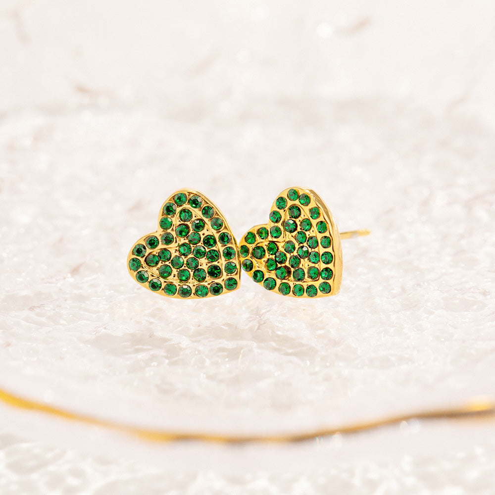 Close-up of the green zircon heart earrings