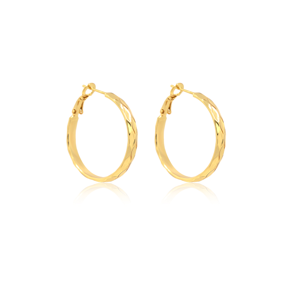 Detailed view of the textured surface on the Gold Diamond-cut Hoops
